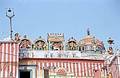 Varanasi , Kedara Ghat with the red and white-striped temple of Kedaresvara lingam